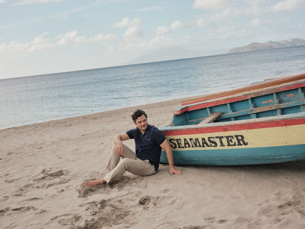 Two men kayaking in a river.