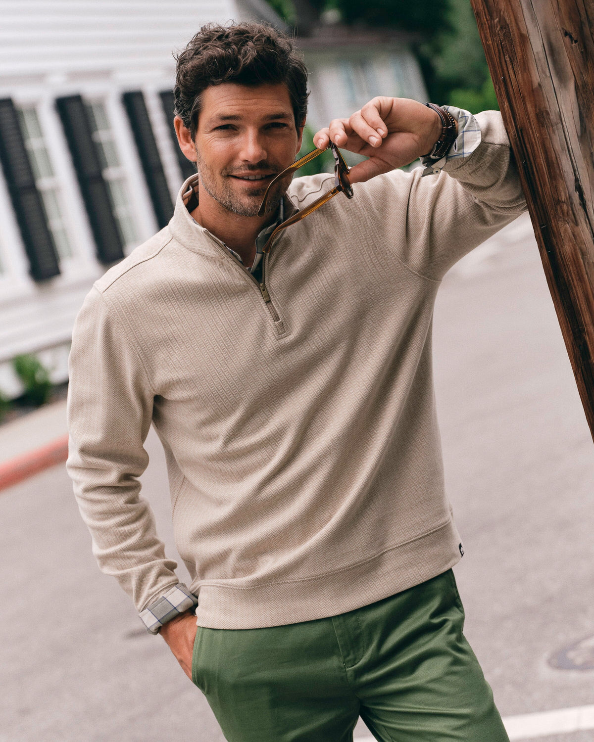 The lifestyle view of the Southern Tide Adler Lane Quarter Zip by Southern Tide - Sandstone Khaki