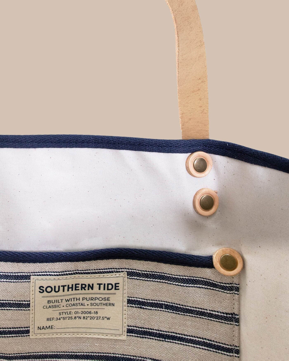 The detail view of the All Day Denim Tote by Southern Tide - Navy