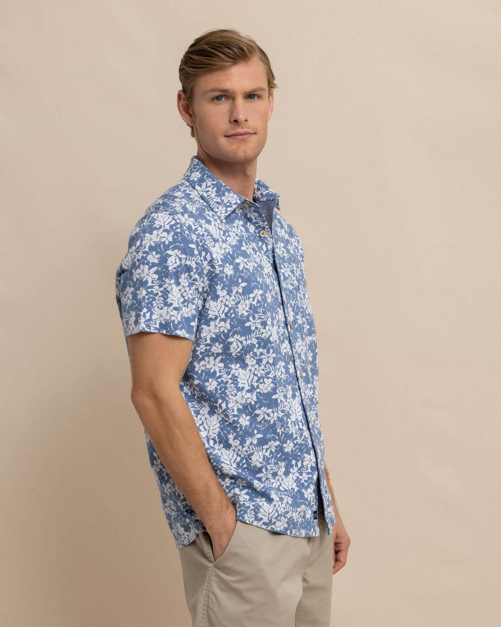 The front view of the Southern Tide Beachcast Island Blooms Knit Short Sleeve Sport Shirt by Southern Tide - Coronet Blue