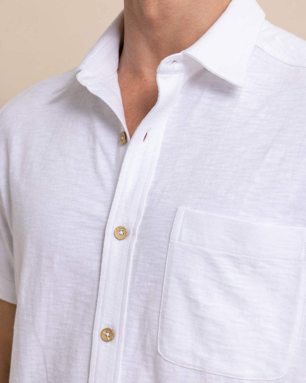 The detail view of the Southern Tide Beachcast Solid Knit Short Sleeve Sport Shirt by Southern Tide - Classic White