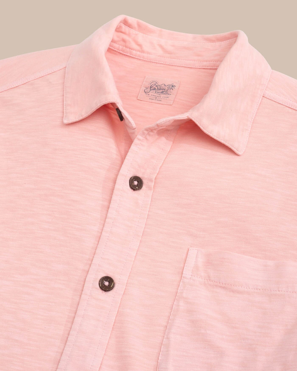 The detail view of the Southern Tide Beachcast Solid Knit Short Sleeve Sport Shirt by Southern Tide - Pale Rosette Pink