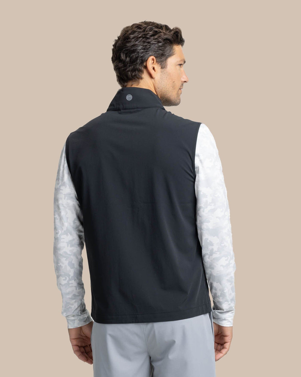 The back view of the Southern Tide Bowline Performance Vest by Southern Tide - Caviar Black