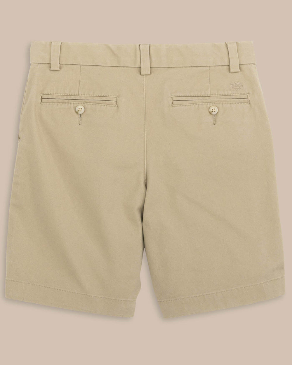 The back view of the Boys Channel Marker Short by Southern Tide - Sandstone Khaki