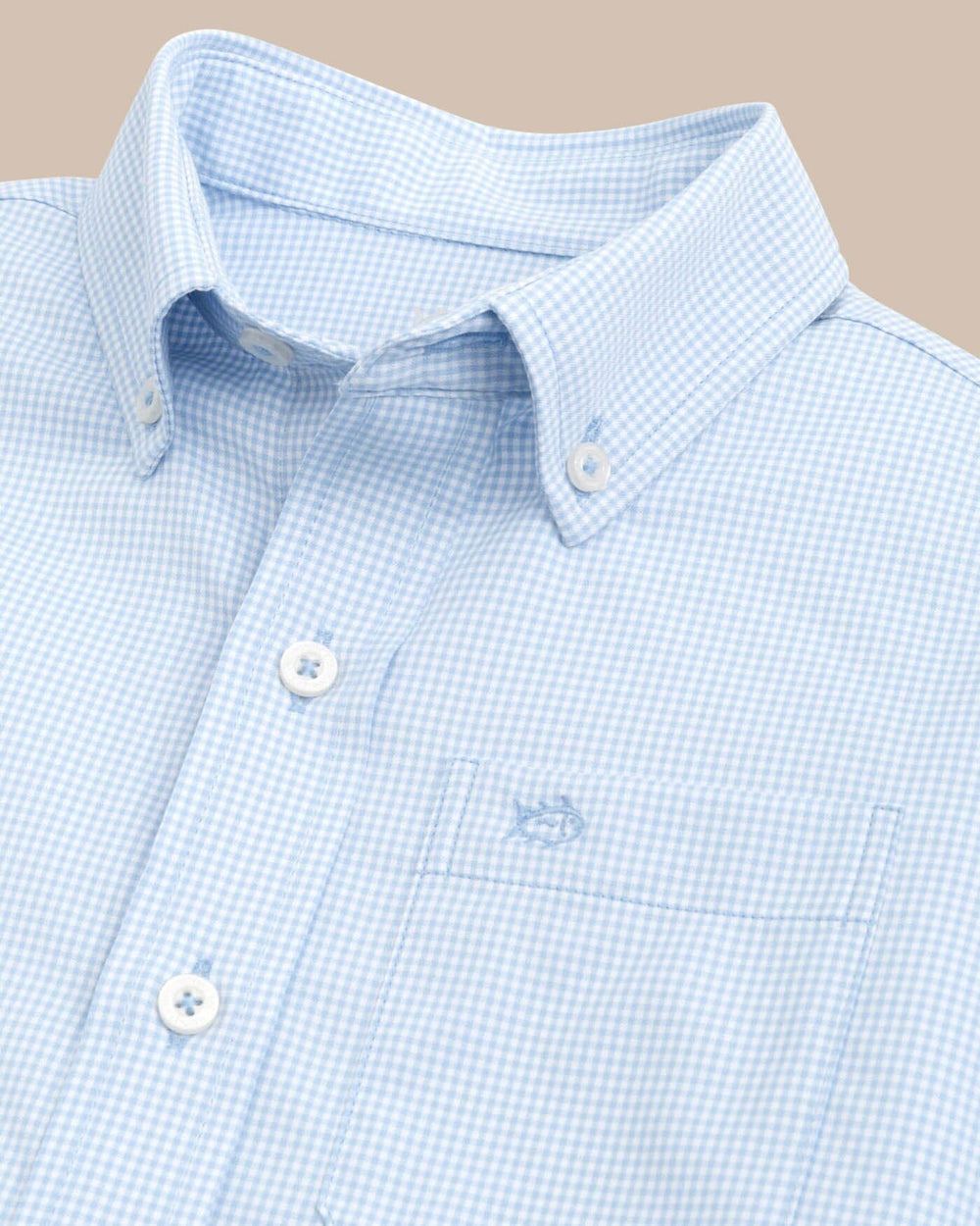 The detail view of the Southern Tide Boys mini gingham intercoastal buttn down shirt by Southern Tide - Tide Blue
