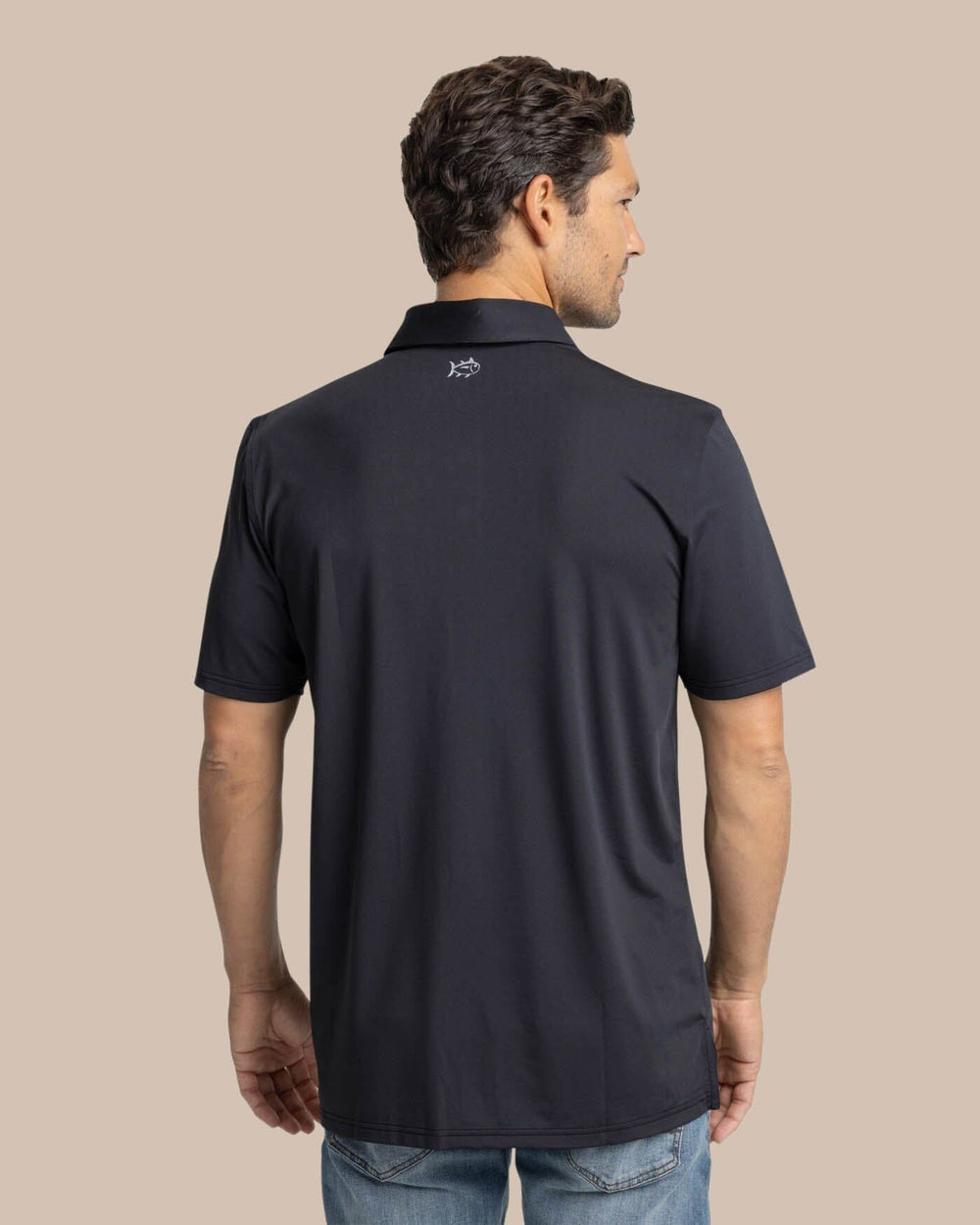 The back view of the Southern Tide Brenton Chest Stripe Performance Polo by Southern Tide - Black