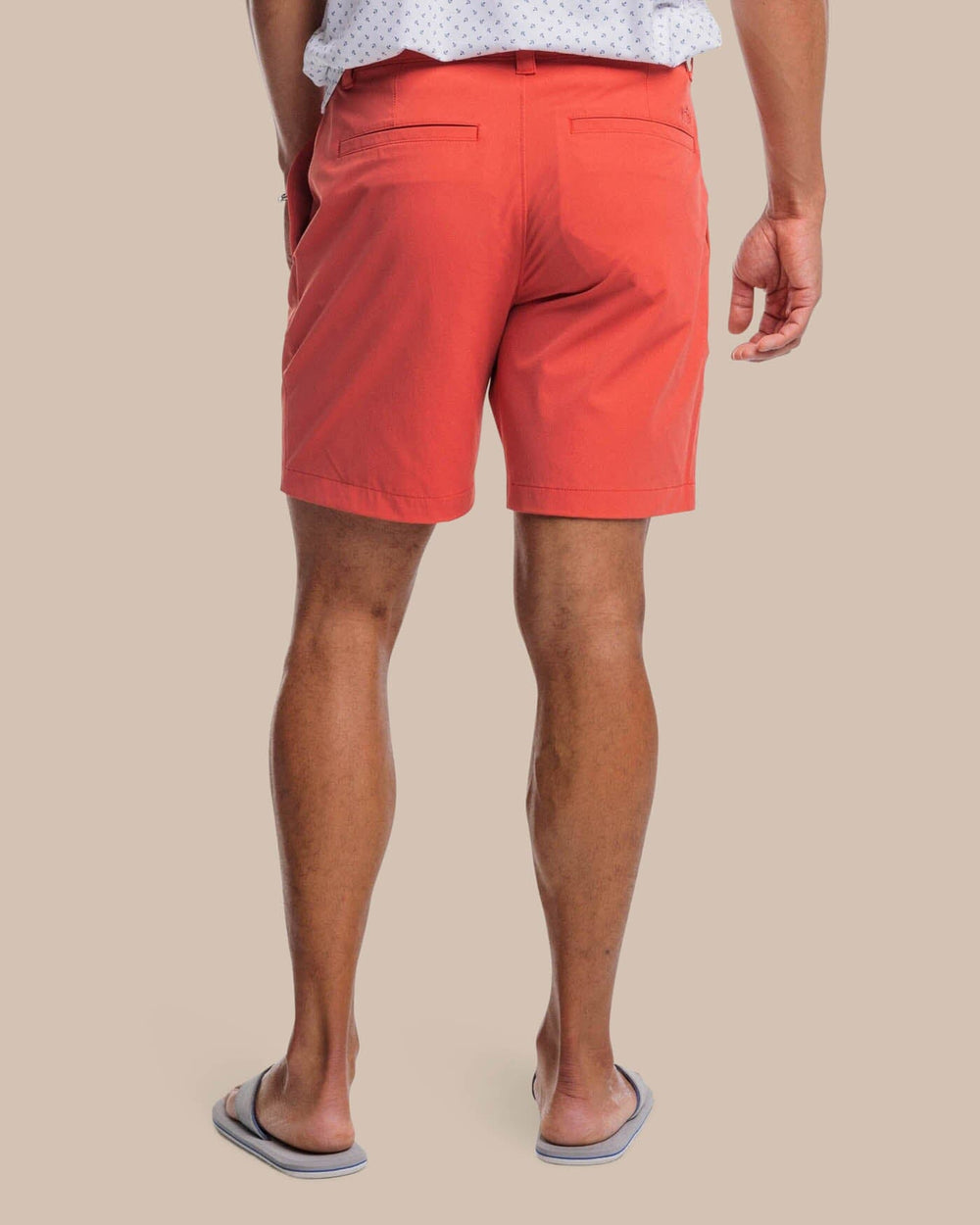 The back view of the Southern Tide brrr°®-die 8 Inch Performance Short by Southern Tide - Mineral Red