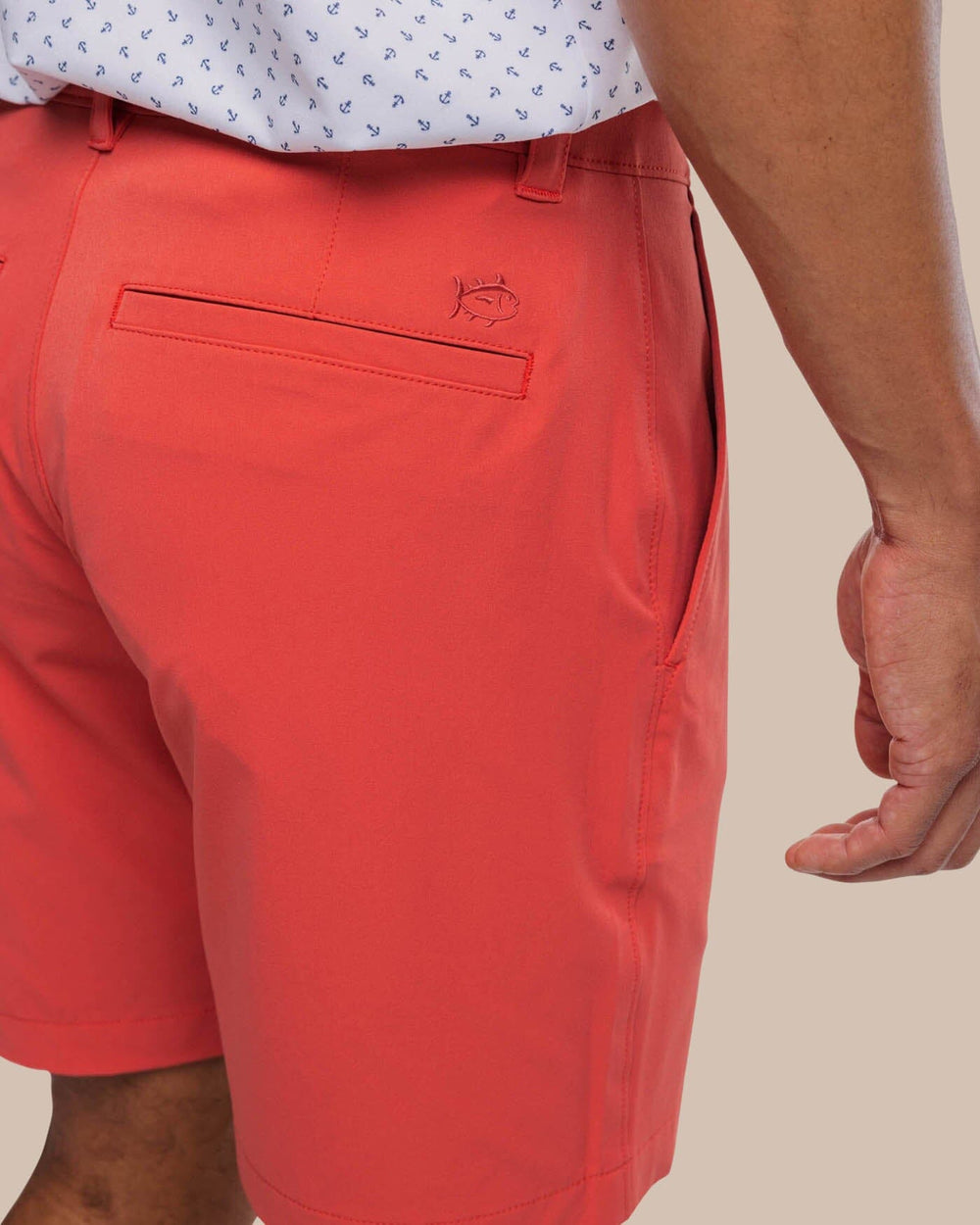 The detail view of the Southern Tide brrr°®-die 8 Inch Performance Short by Southern Tide - Mineral Red