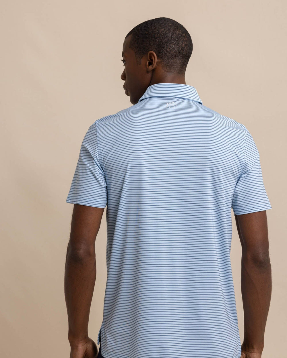 The back view of the Southern Tide brrr-eeze Baytop Stripe Performance Polo by Southern Tide - Clearwater Blue
