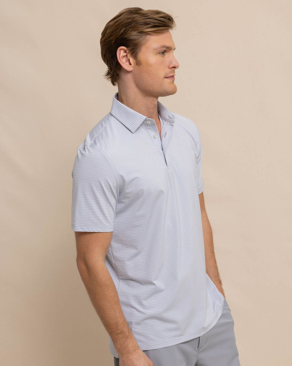 The front view of the Southern Tide brrr-eeze Baytop Stripe Performance Polo by Southern Tide - Platinum Grey
