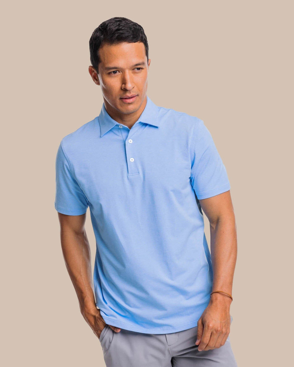 The front view of the brrr°®-eeze Heather Performance Polo Shirt by Southern Tide - Heather Ocean Channel
