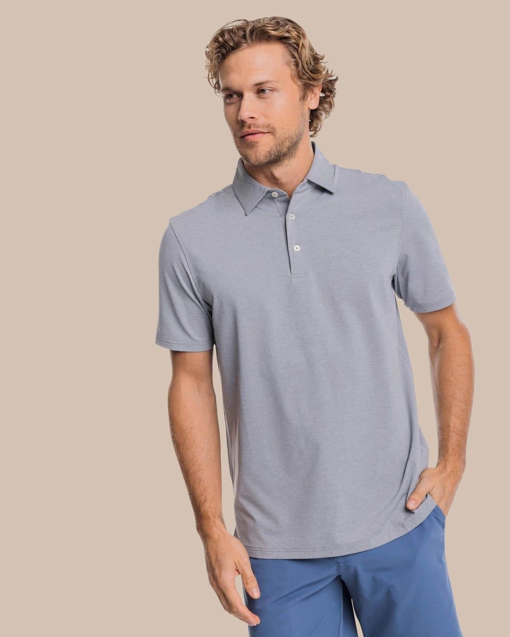 The front view of the brrr°®-eeze Heather Performance Polo Shirt by Southern Tide - Heather Steel Grey