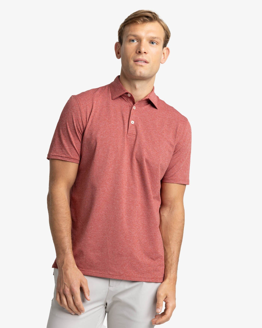 The front view of the Southern Tide brrr-eeze Heather Performance Polo Shirt by Southern Tide - Heather Tuscany Red