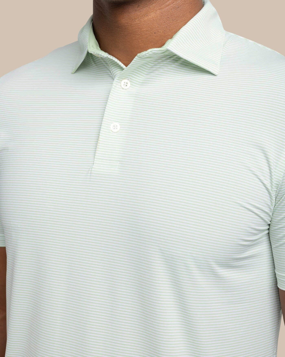 The detail view of the Southern Tide brrr-eeze Meadowbrook Stripe Polo by Southern Tide - Smoke Green