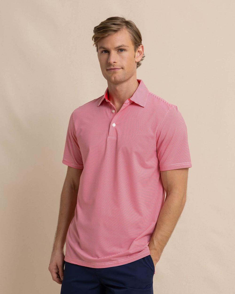 The front view of the Southern Tide brrr-eeze-meadowbrook-stripe-polo by Southern Tide - Teaberry Pink