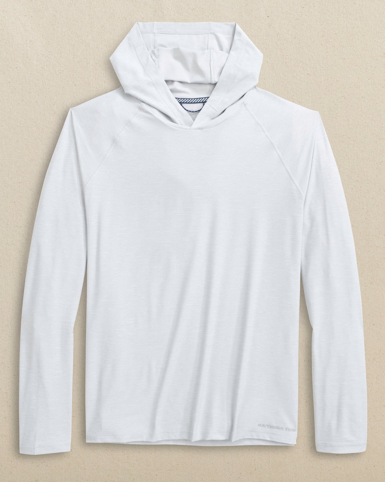 The front view of the Southern Tide brrr°®-illiant Performance Hoodie by Southern Tide - Platinum Grey