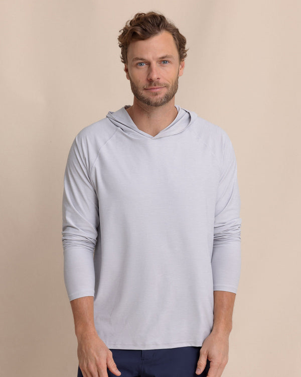 The front view of the Southern Tide brrr°®-illiant Performance Hoodie by Southern Tide - Platinum Grey