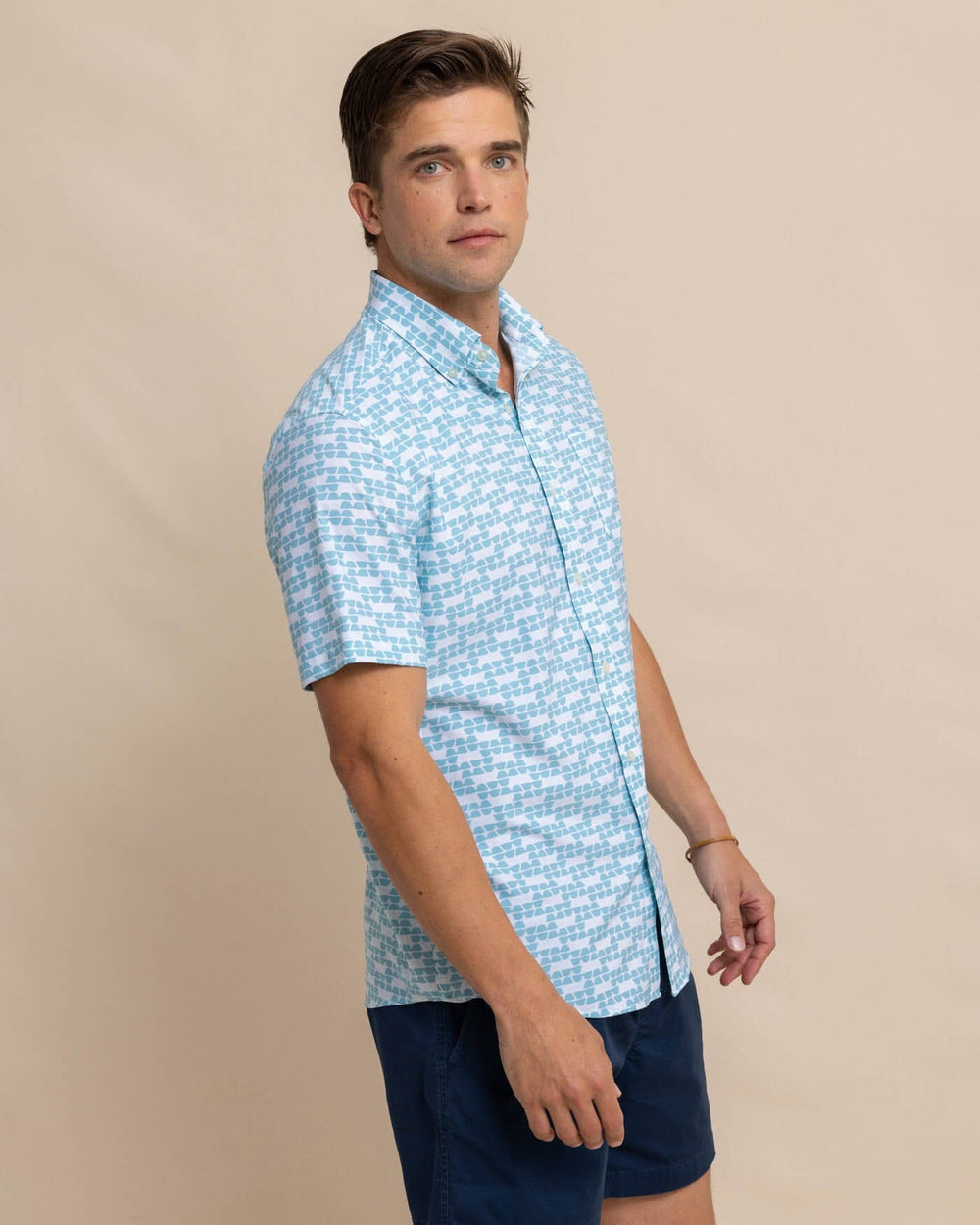 The front view of the Southern Tide brrr Intercoastal Heather Stay Shady Short Sleeve Sport Shirt by Southern Tide - Heather Wake Blue