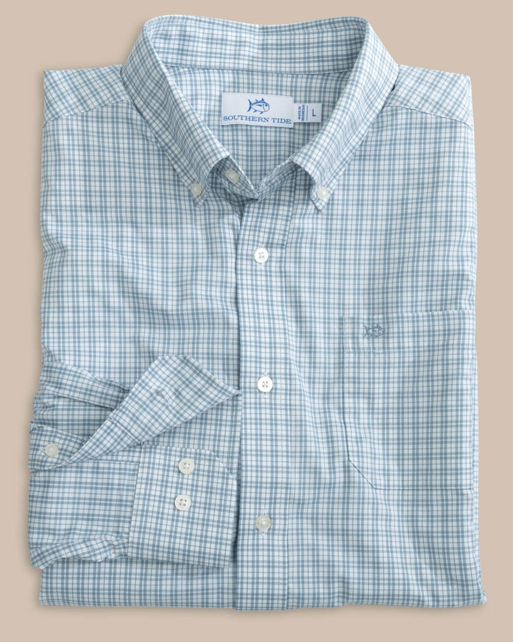 The front view of the Southern Tide brrr Intercoastal Poinsett Plaid Long Sleeve Sportshirt by Southern Tide - Windward Blue
