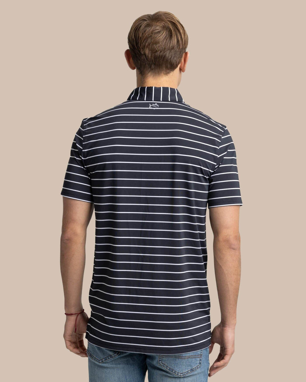 The back view of the Southern Tide brrr-eeze Desmond Stripe Performance Polo by Southern Tide - Black