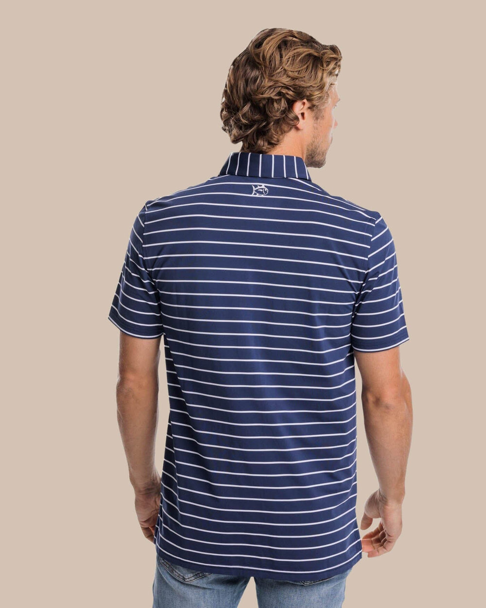 The back view of the Southern Tide brrr-eeze Desmond Stripe Performance Polo by Southern Tide - Navy