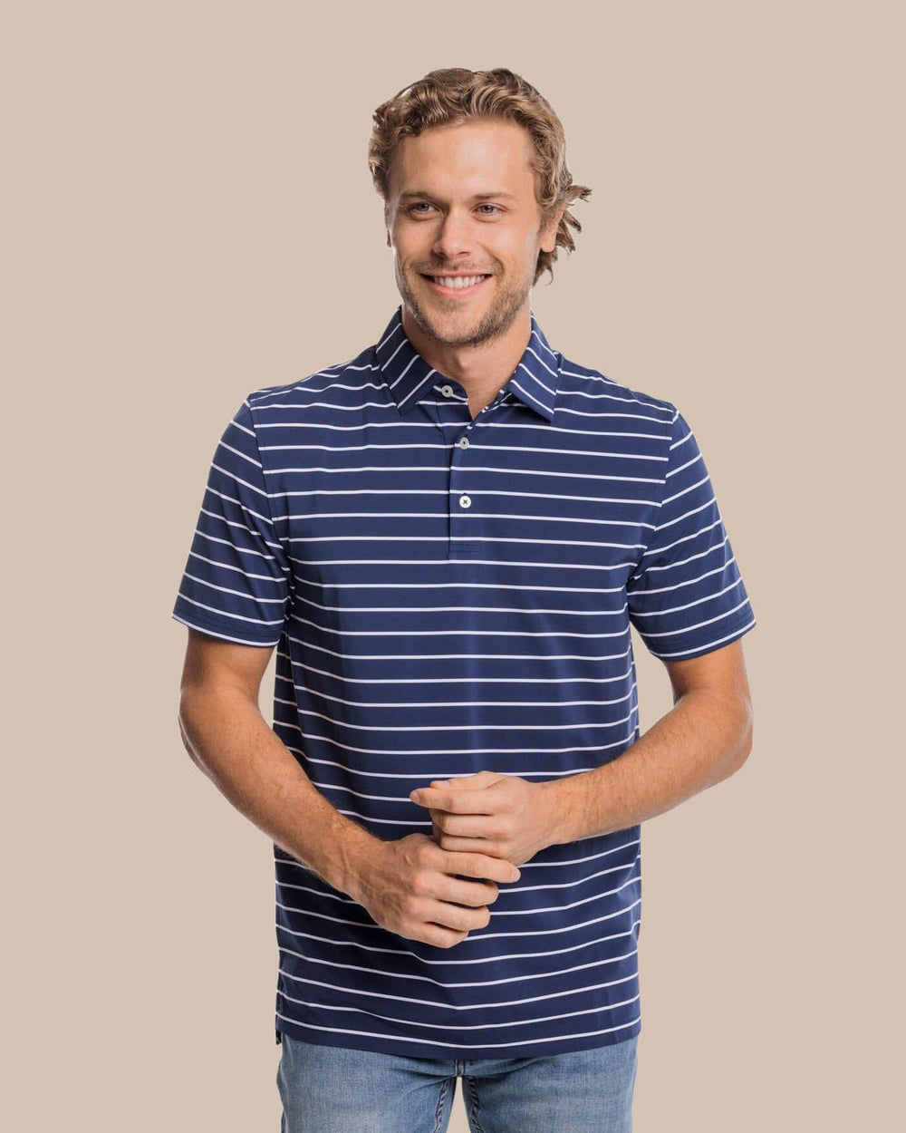 The front view of the Southern Tide brrr-eeze Desmond Stripe Performance Polo by Southern Tide - Navy