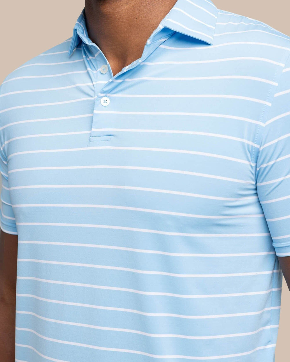 The detail view of the Southern Tide brrr-eeze Desmond Stripe Performance Polo by Southern Tide - Rush Blue