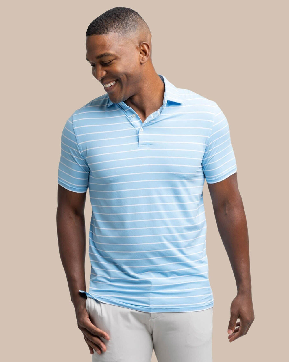 The front view of the Southern Tide brrr-eeze Desmond Stripe Performance Polo by Southern Tide - Rush Blue
