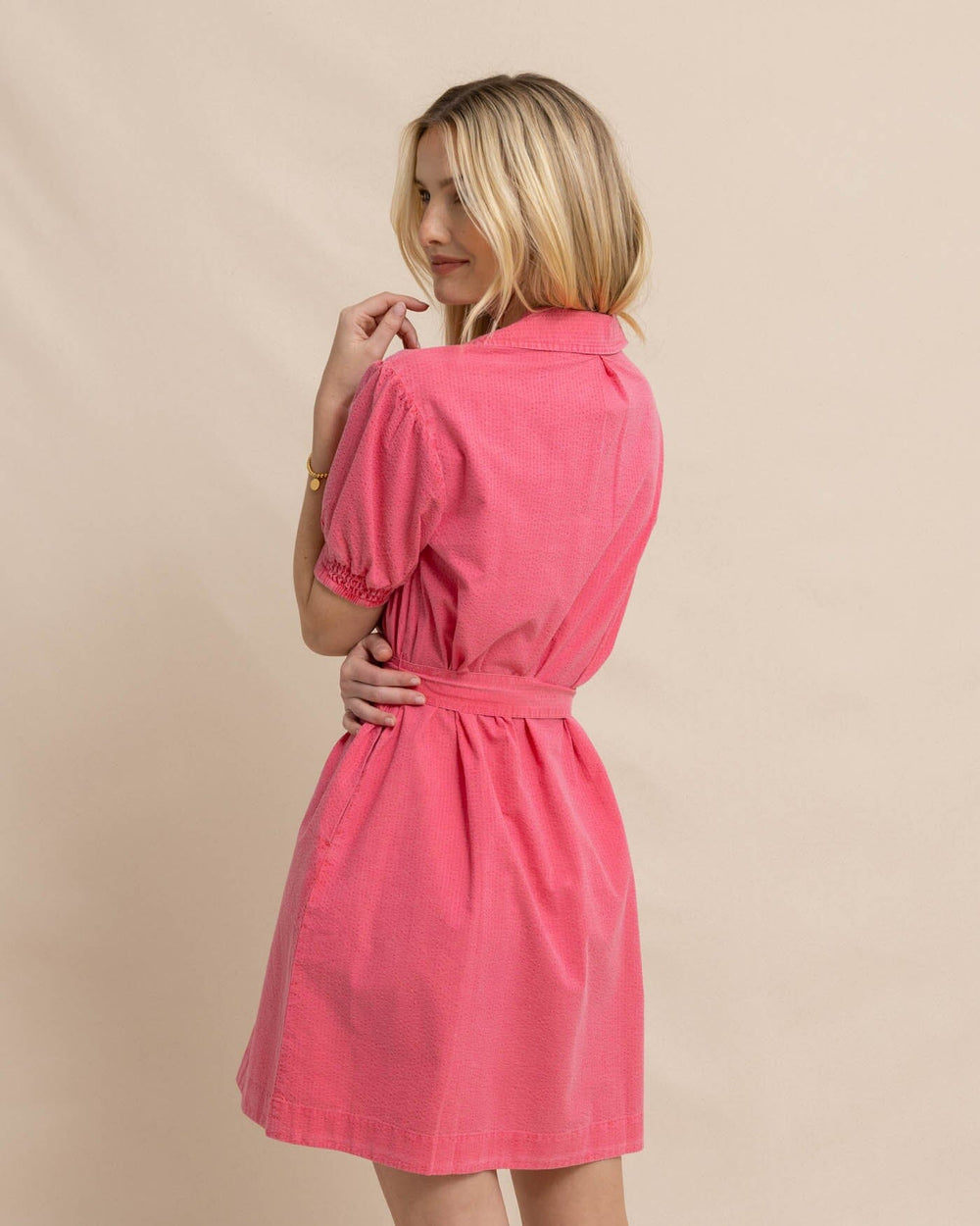 The back view of the Southern Tide Calan Washed Seersucker Dress by Southern Tide - Camelia Rose Pink