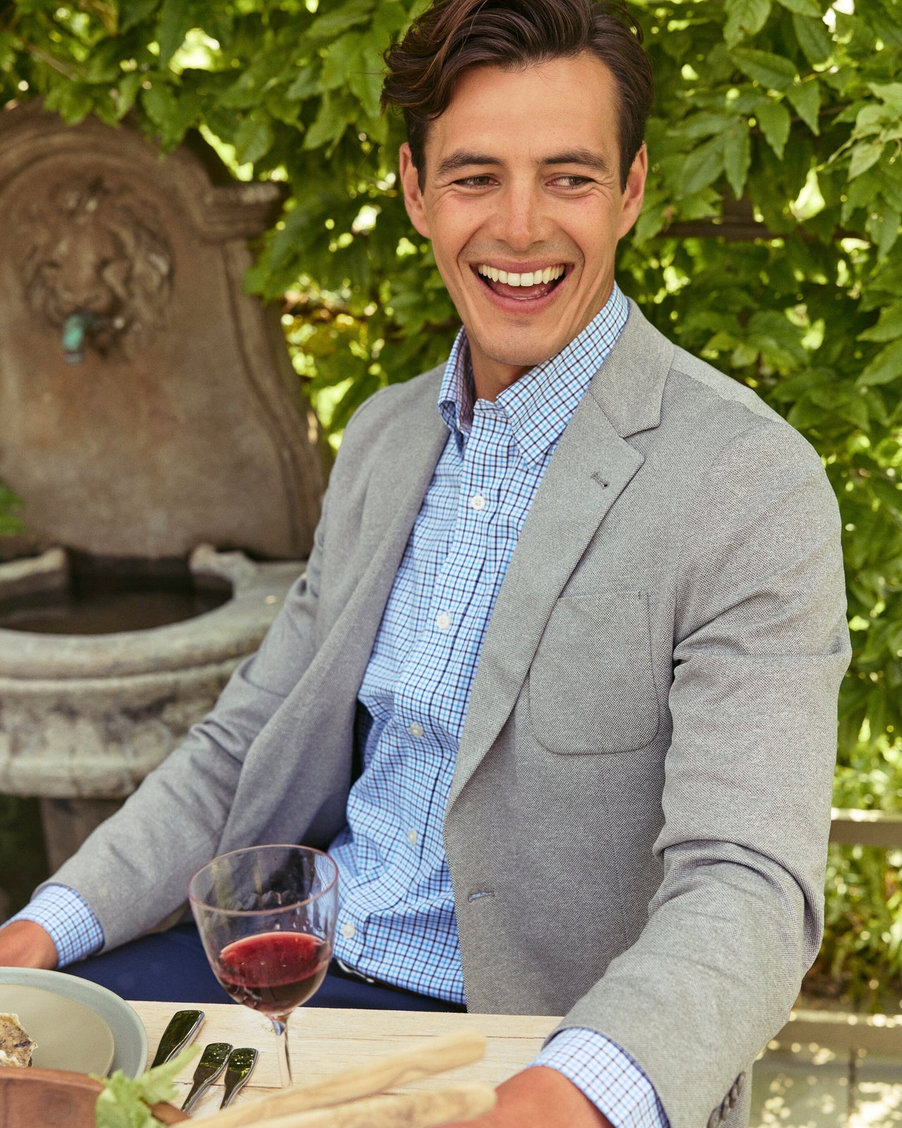 The lifestyle view of the Southern Tide Charleston Blazer by Southern Tide - Heather Steel Grey