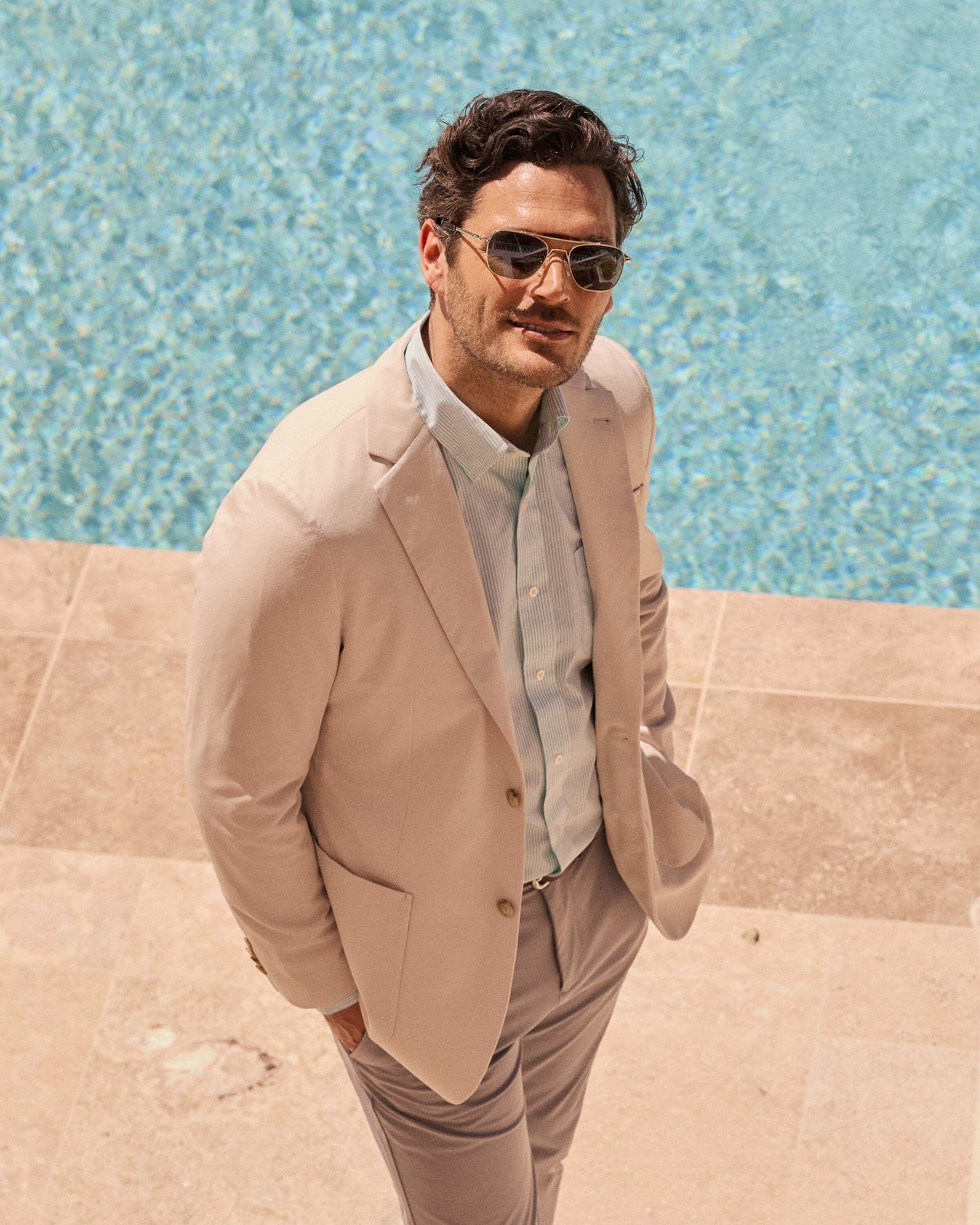The lifestyle view of the Southern Tide Charleston Blazer by Southern Tide - Perfectly Pale Khaki