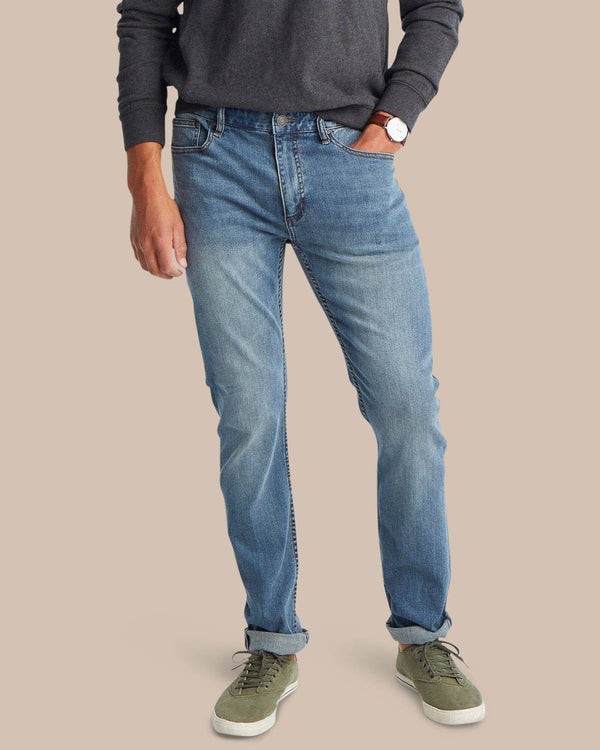 The front view of the Men's Blue Denim Charleston Denim Jeans by Southern Tide - Medium Wash