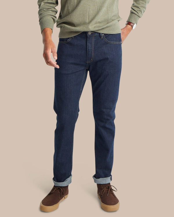 The front view of the Men's Blue Denim Charleston Denim Jeans by Southern Tide - Rinse