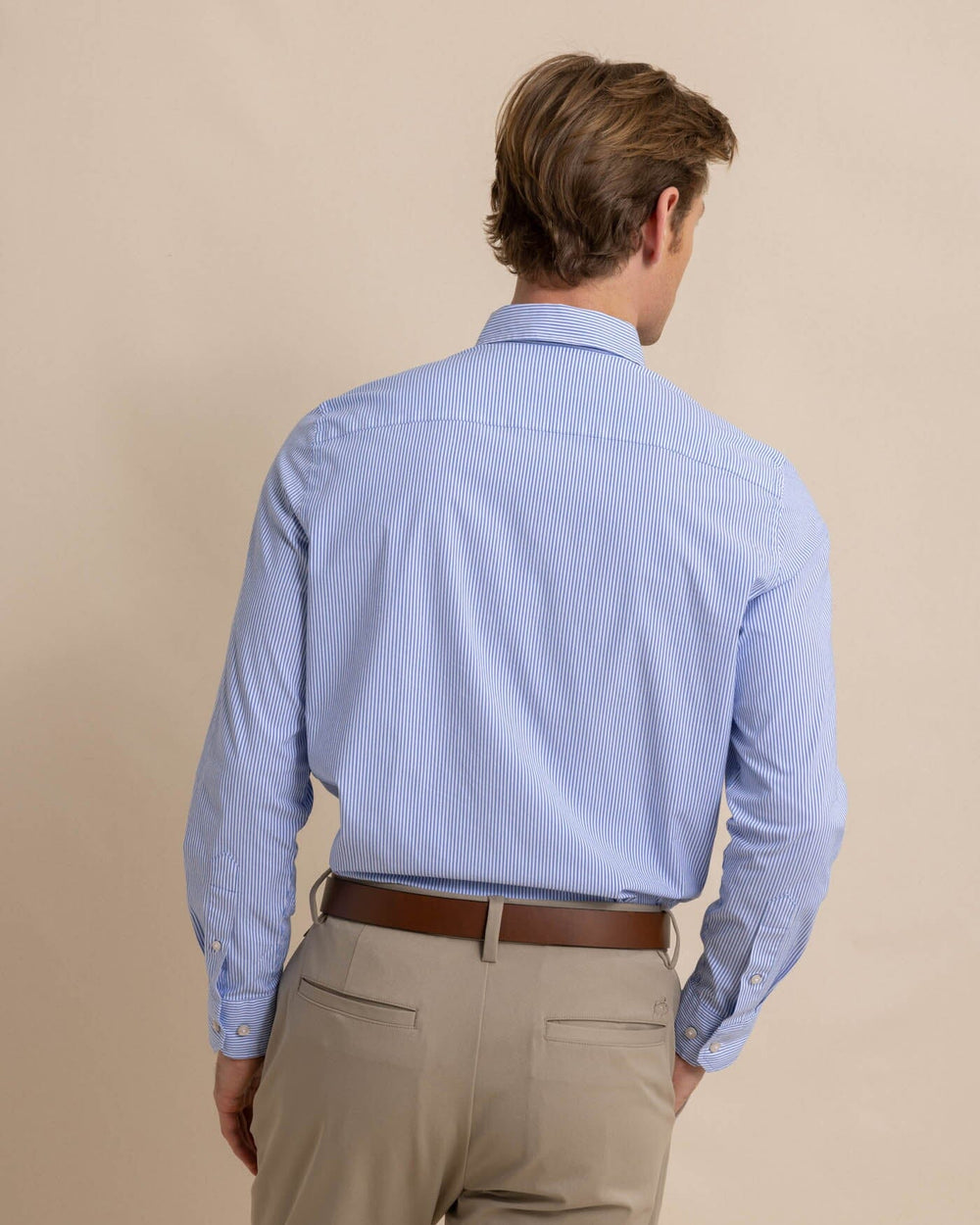 The back view of the Southern Tide Charleston Granby Stripe Long Sleeve Sport Shirt by Southern Tide - Cobalt Blue