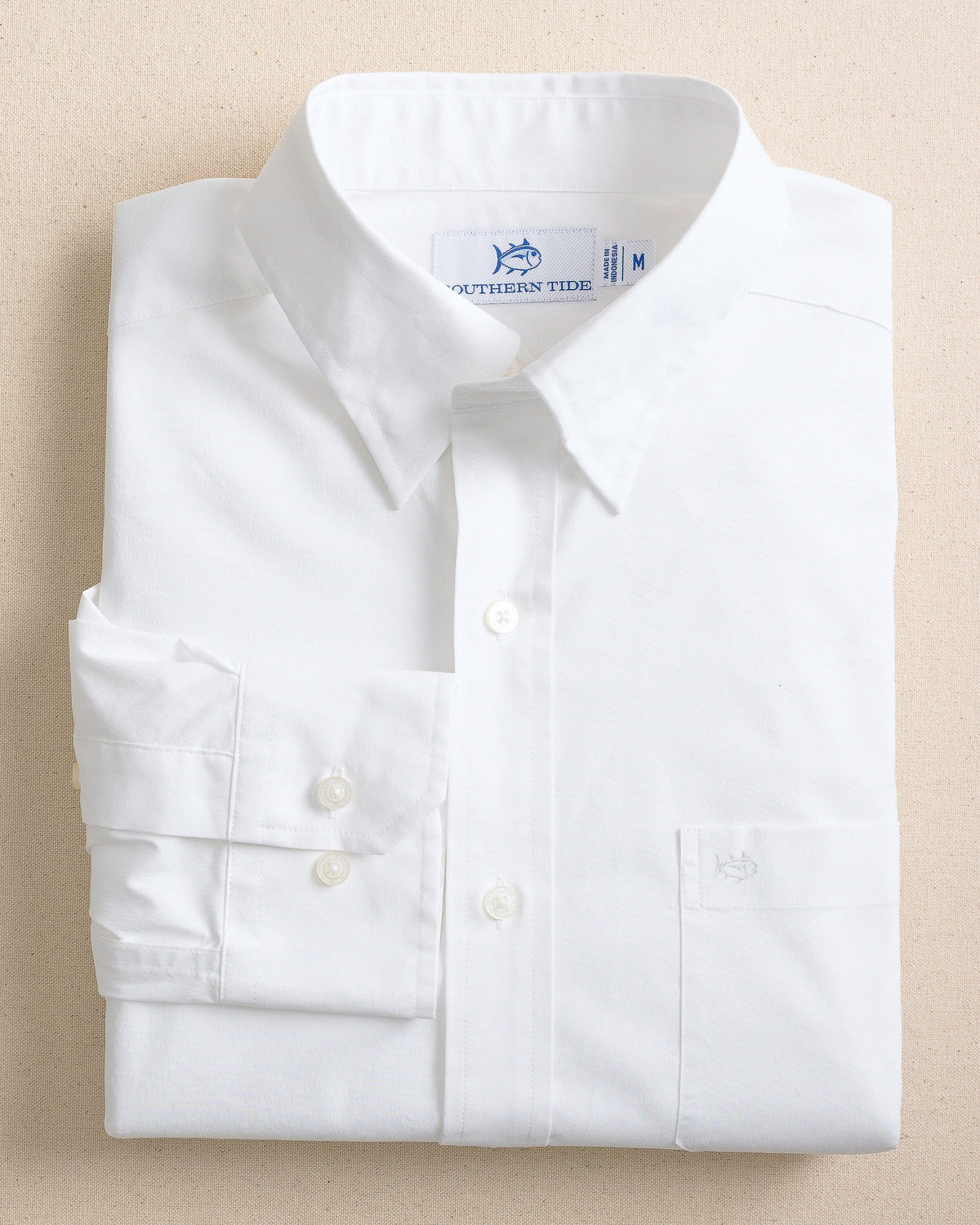 The front view of the Southern Tide Charleston Overbrook Solid Embroidered Sport Shirt by Southern Tide - Classic White