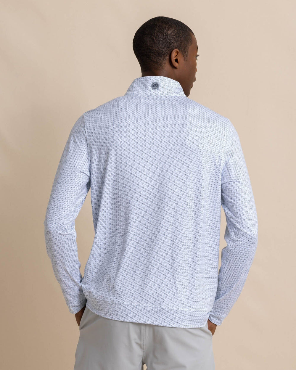 The back view of the Southern Tide Clubbin It Print Cruiser Quarter Zip by Southern Tide - Classic White