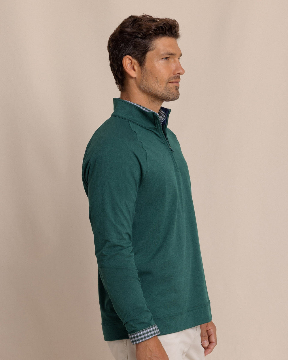 The side view of the Southern Tide Cruiser Heather Quarter Zip Pullover by Southern Tide - Heather Salt Meadow