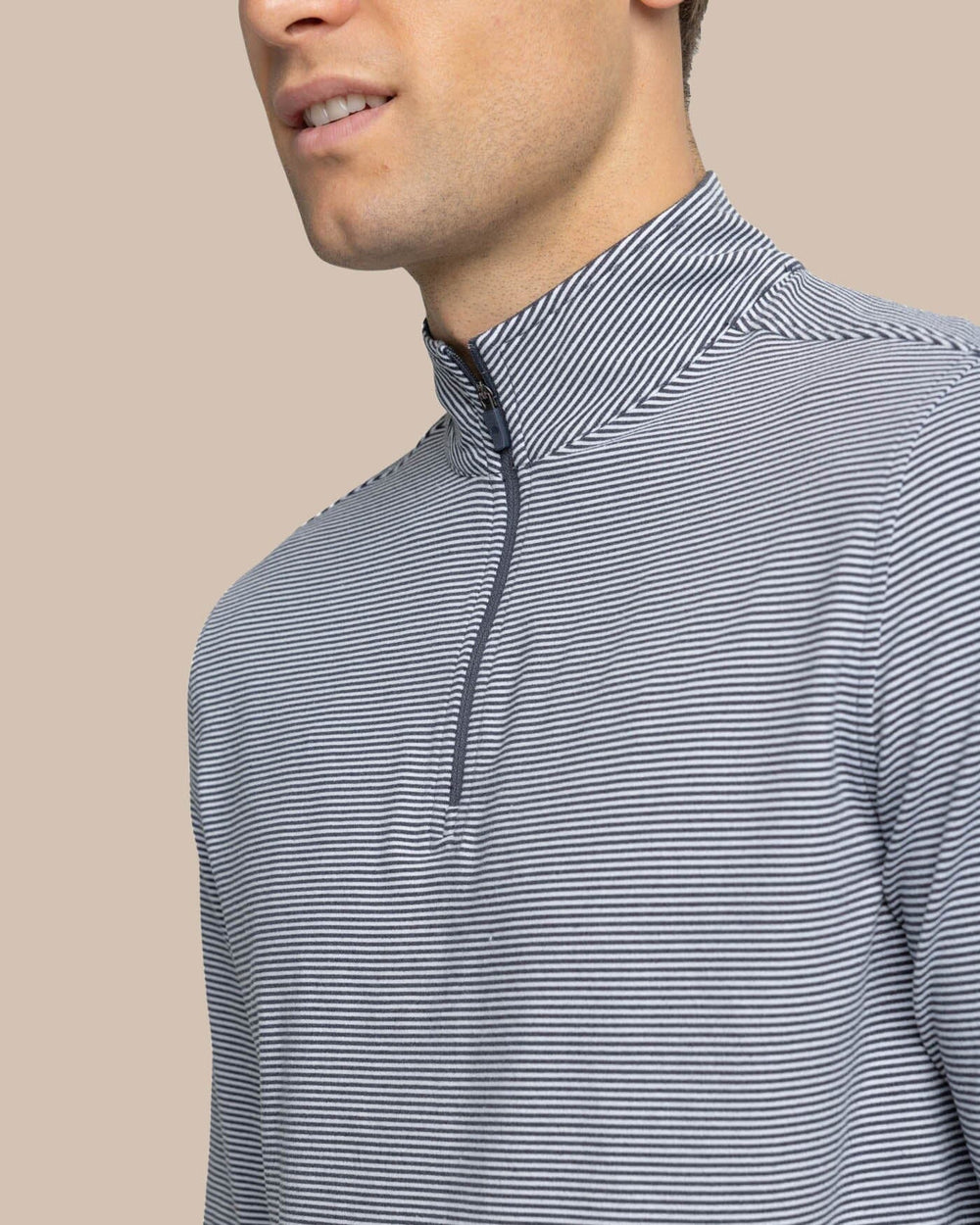 The detail view of the Southern Tide Cruiser Micro-Stripe Heather Quarter Zip by Southern Tide - Heather Black