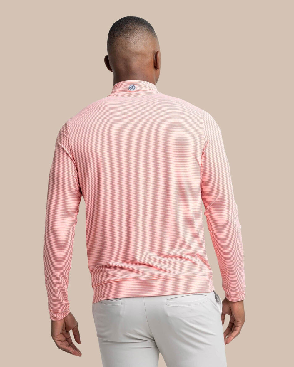 The back view of the Southern Tide Cruiser Micro-Stripe Heather Quarter Zip by Southern Tide - Heather Endzone Orange