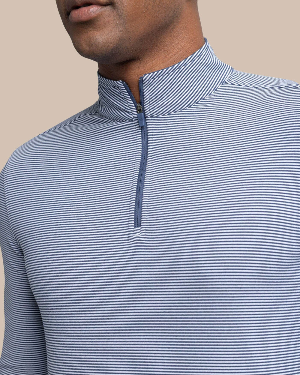 The detail view of the Southern Tide Cruiser Micro-Stripe Heather Quarter Zip by Southern Tide - Heather Navy