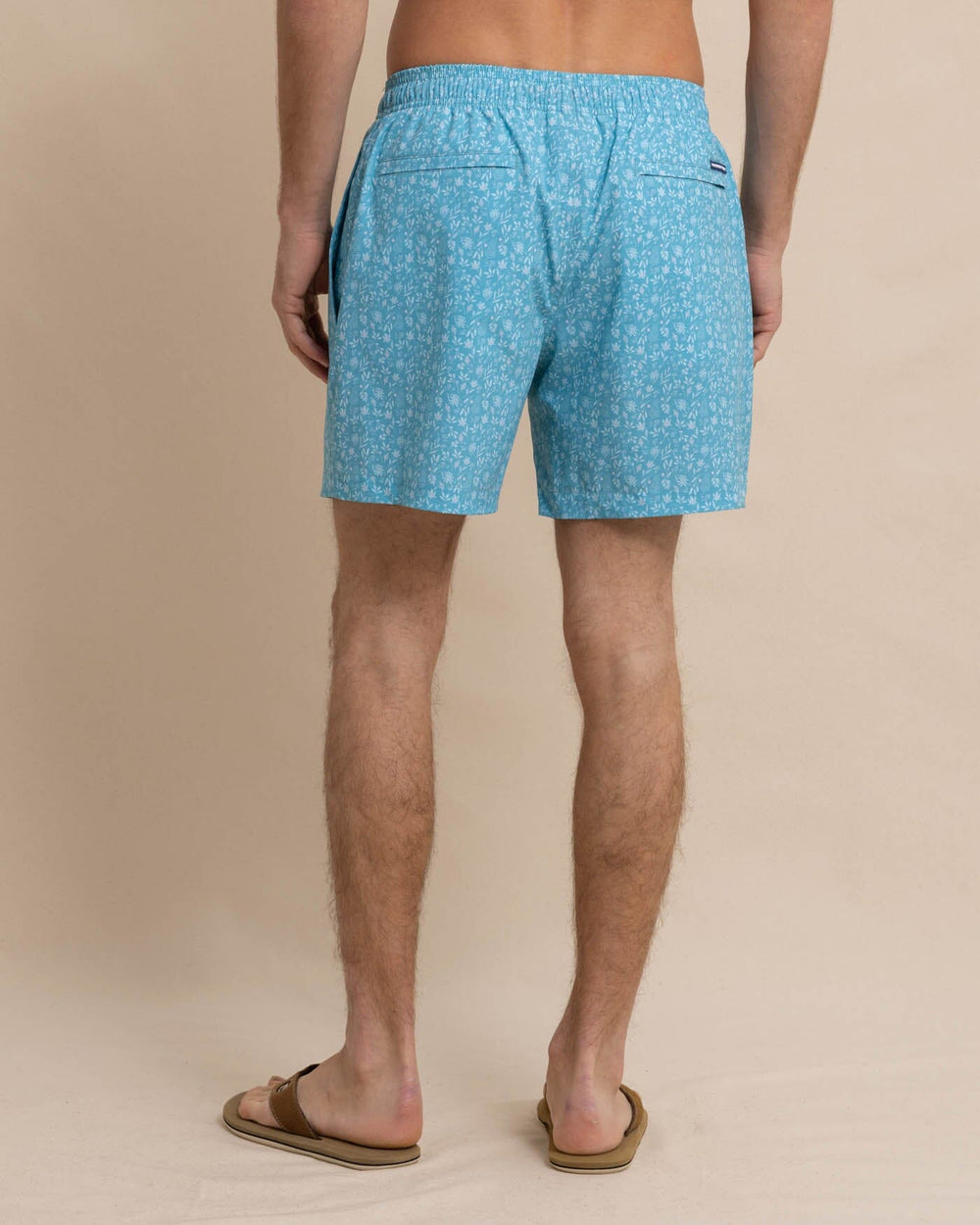 The back view of the Southern Tide Ditzy Floral Swim Trunk by Southern Tide - Ocean Aqua