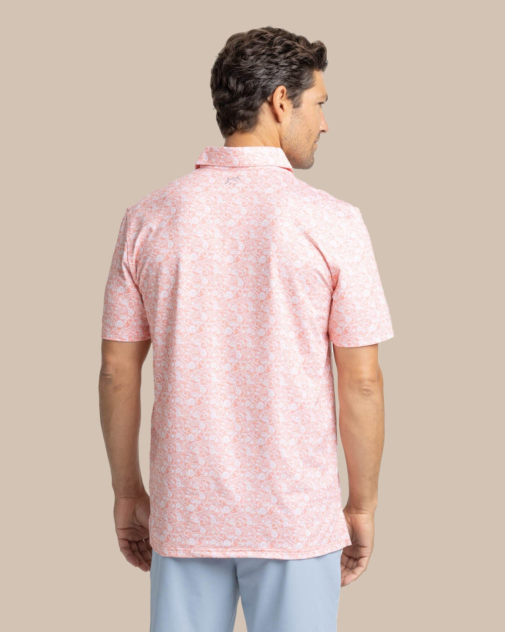 The back view of the Southern Tide Driver Caps Off Printed Polo by Southern Tide - Desert Flower Coral