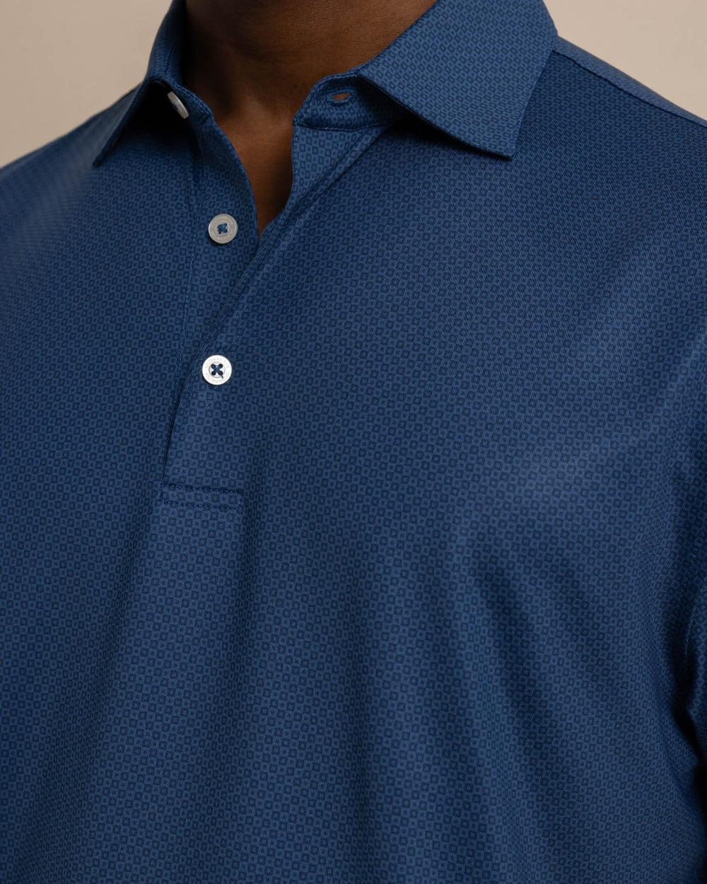 The detail view of the Southern Tide Driver Coastal Geo Polo Shirt by Southern Tide - Dress Blue