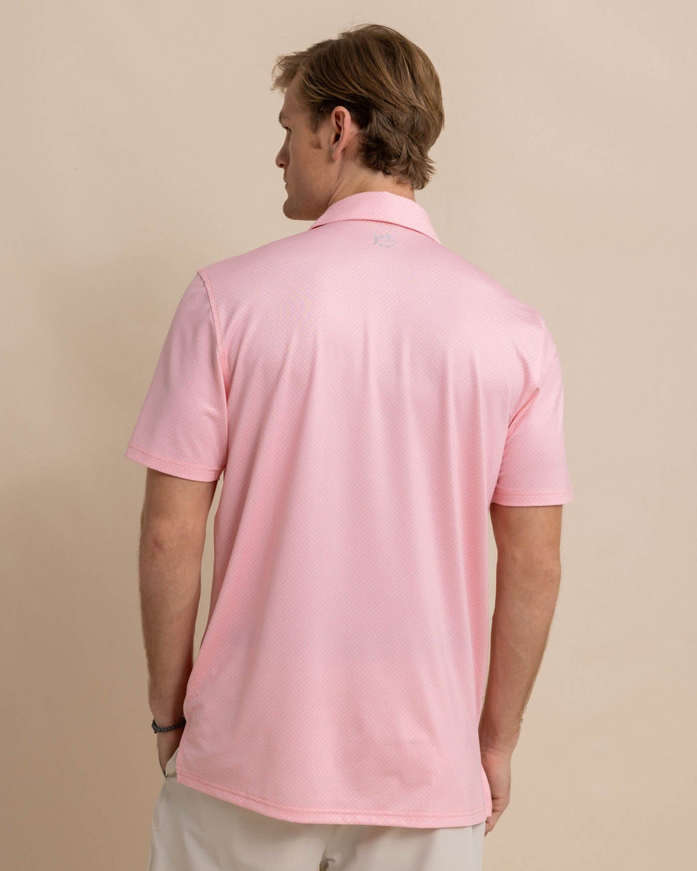 The back view of the Southern Tide Driver Coastal Geo Polo Shirt by Southern Tide - Flamingo Pink