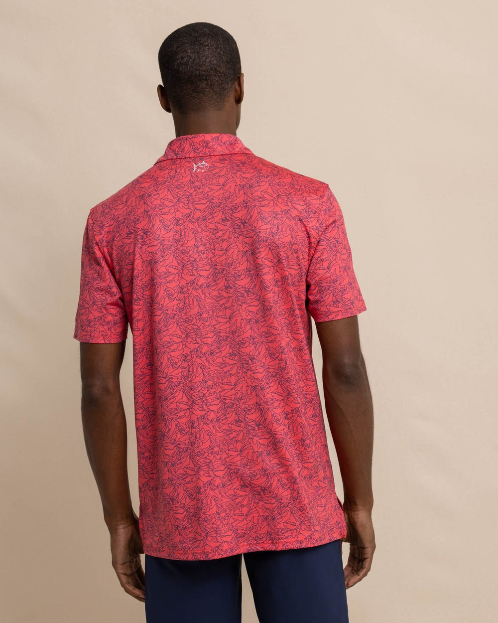 The back view of the Southern Tide Driver Dive In Polo Shirt by Southern Tide - Teaberry Pink