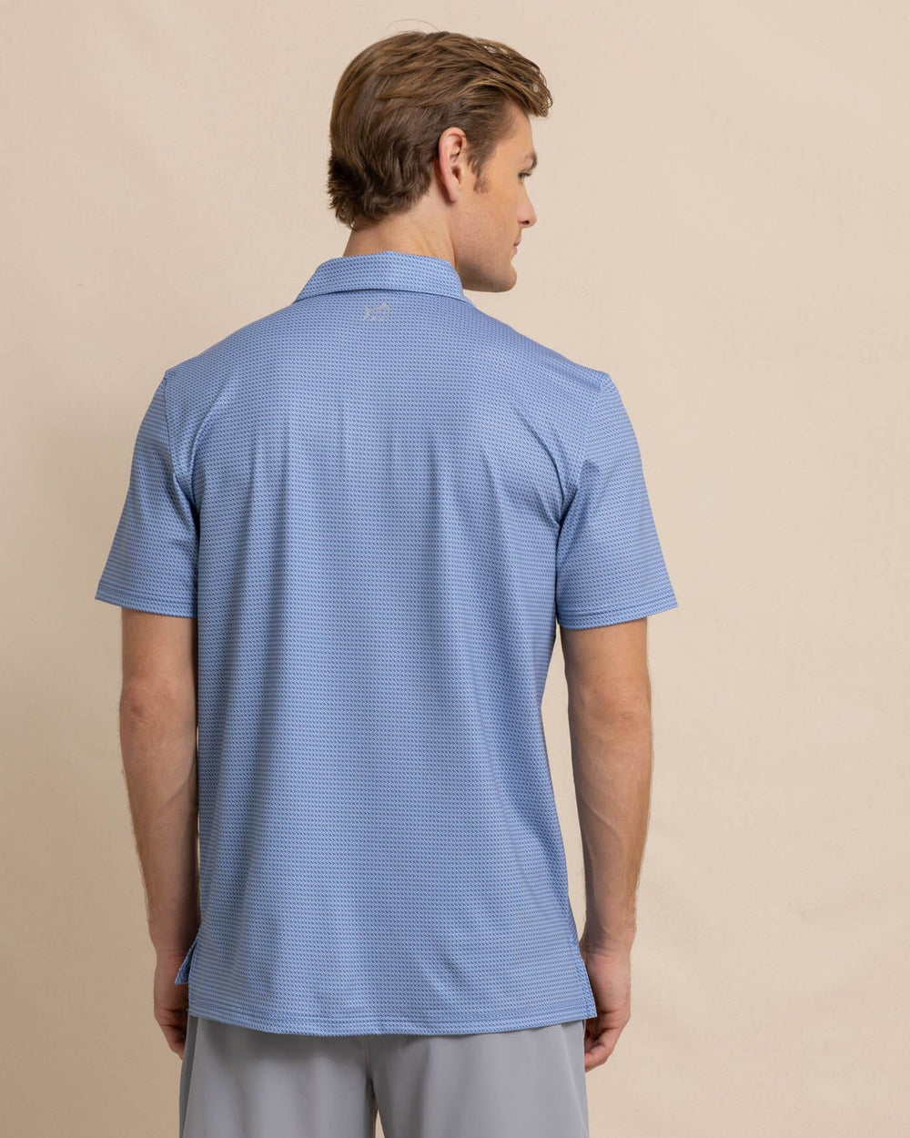 The back view of the Southern Tide Driver Getting Ziggy With It Printed Polo by Southern Tide - Coronet Blue