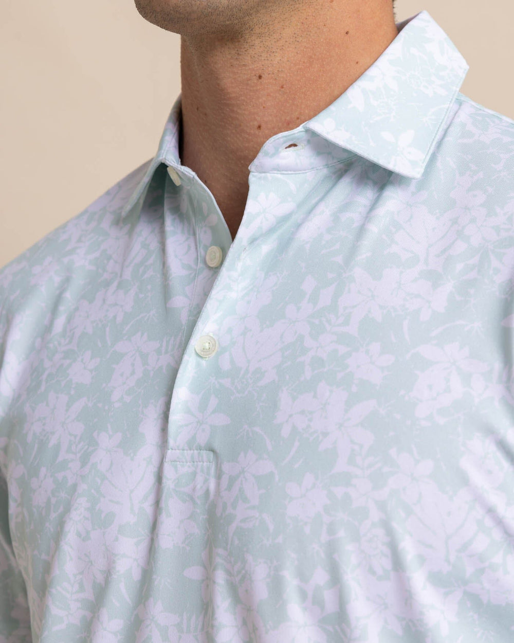 The detail view of the Southern Tide Driver Island Blooms Printed Polo by Southern Tide - Surf Spray Sage