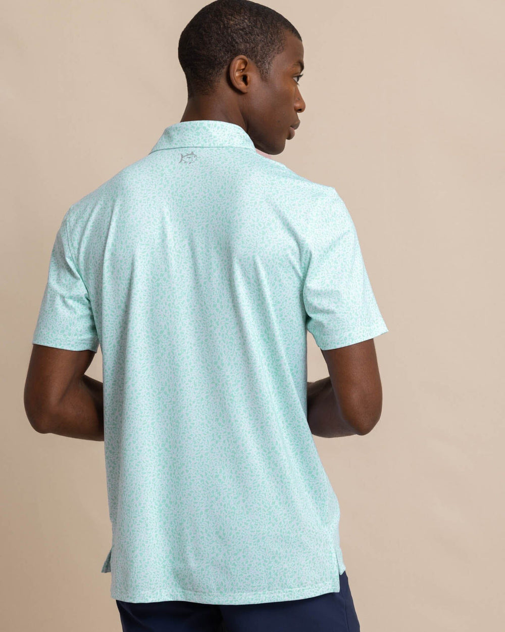 The back view of the Southern Tide Driver That Floral Feeling Printed Polo by Southern Tide - Wake Blue