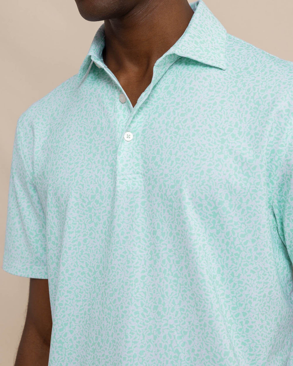 The detail view of the Southern Tide Driver That Floral Feeling Printed Polo by Southern Tide - Wake Blue