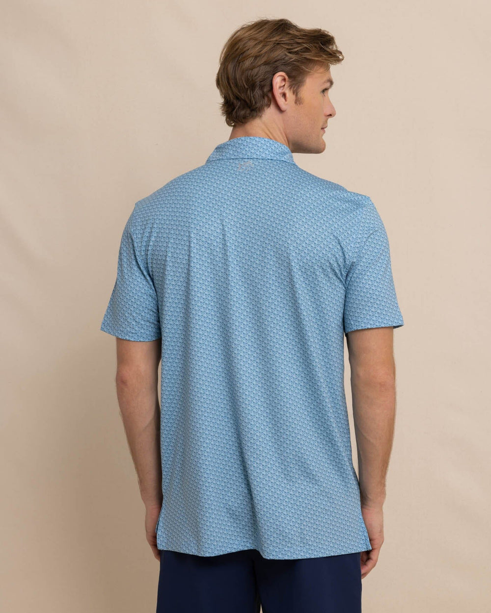 The back view of the Southern Tide Driver Vacation Views Printed Polo by Southern Tide - Clearwater Blue